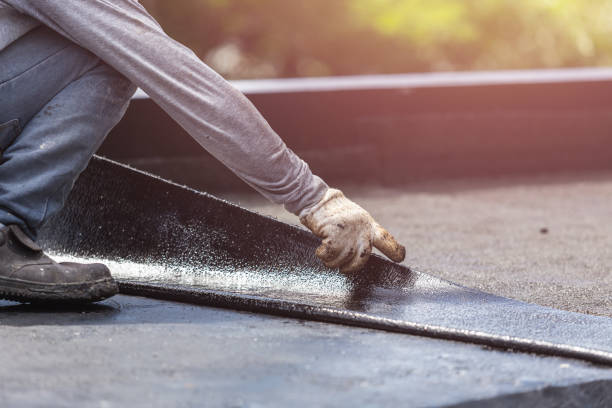 Professional Exterior Waterproofing technician working in Hopkins, MN